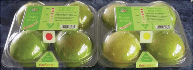 Kemasan Ripesense pada buah pir dengan label kematangan yang berubah dari warna merah ke kuning tergantung tingkat kematangan.